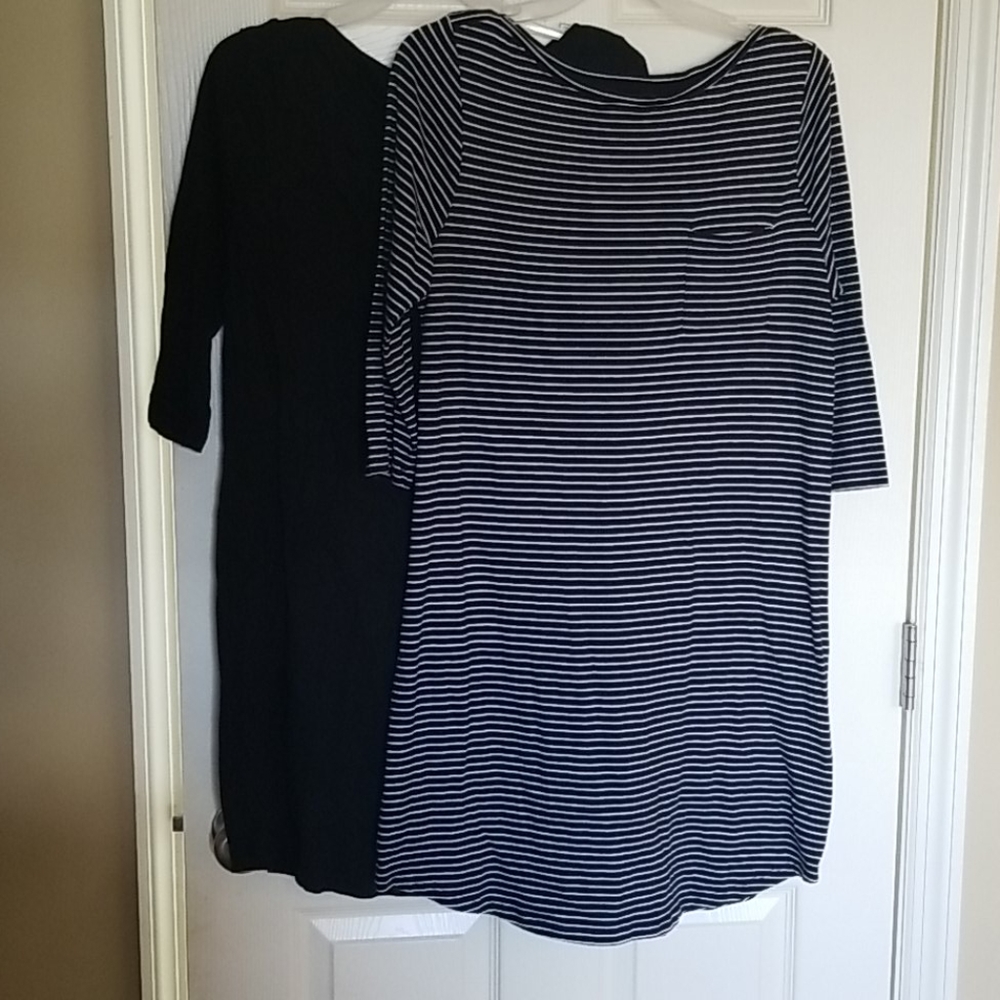 One black and white and one black shirt dress